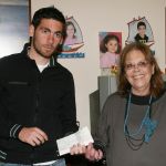 Olympiacos F.C. players close to our fellow citizens